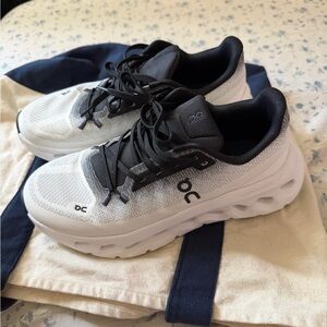 On Running White and Black Sneakers